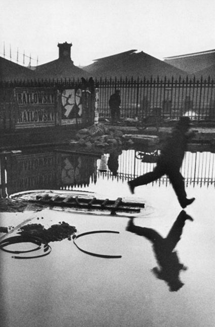 cartier bresson decisive moment man jumping over water
