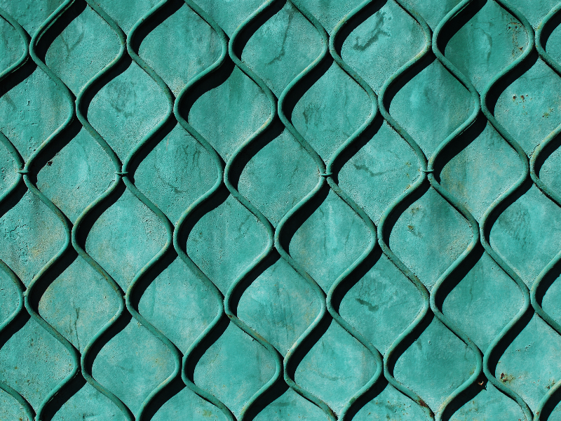 Green Painted Metal Door Texture With Geometric Pattern