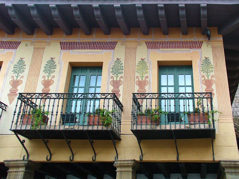 Old Yellow Building With Balconies Stock Image